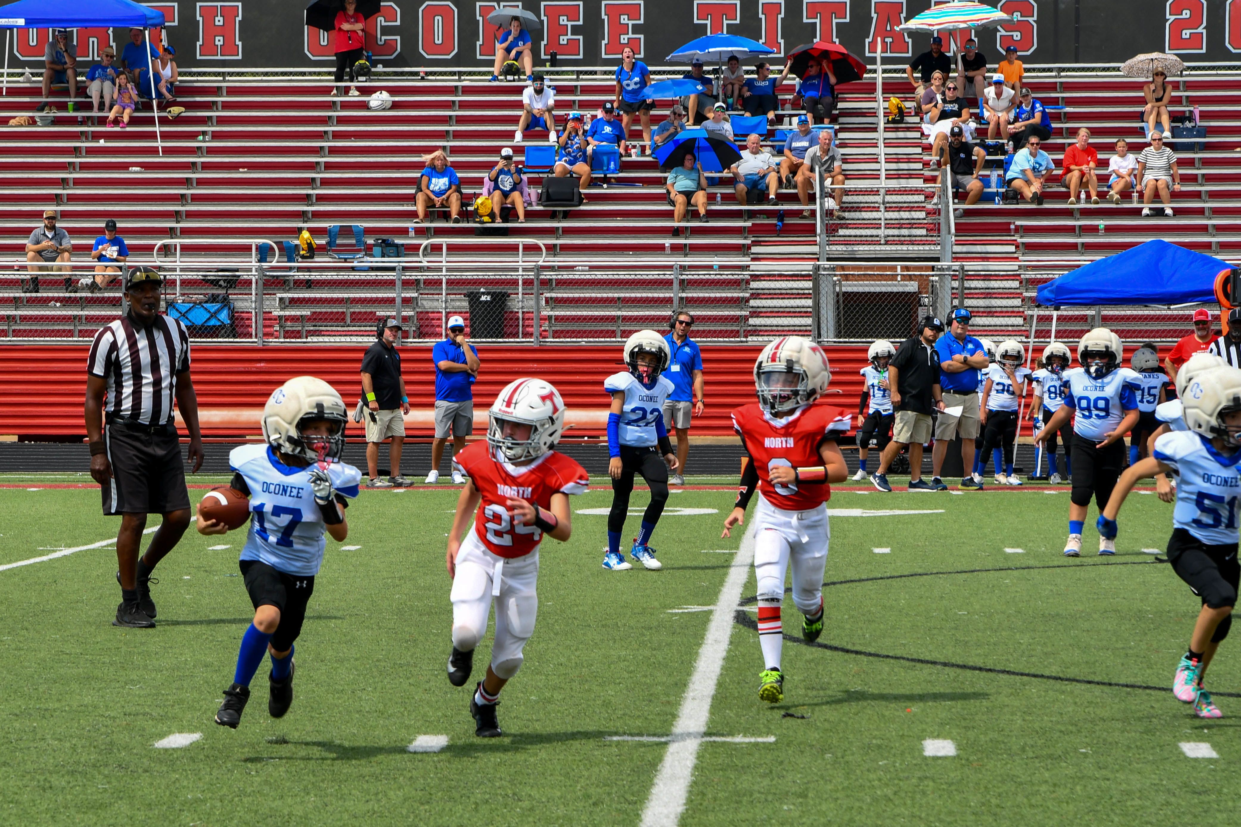 Recreational league football players playing at Titan Field