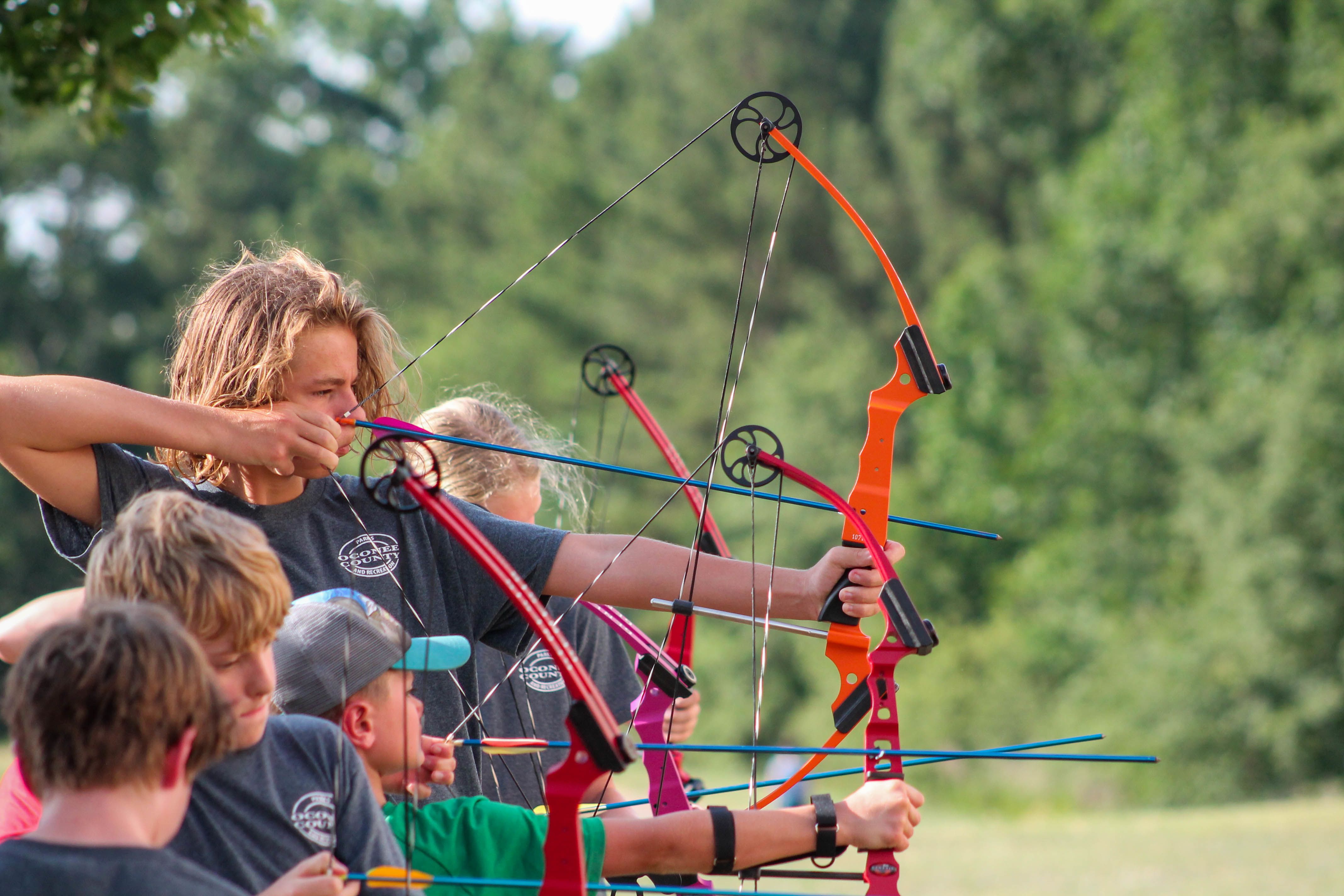 Children at archery practice