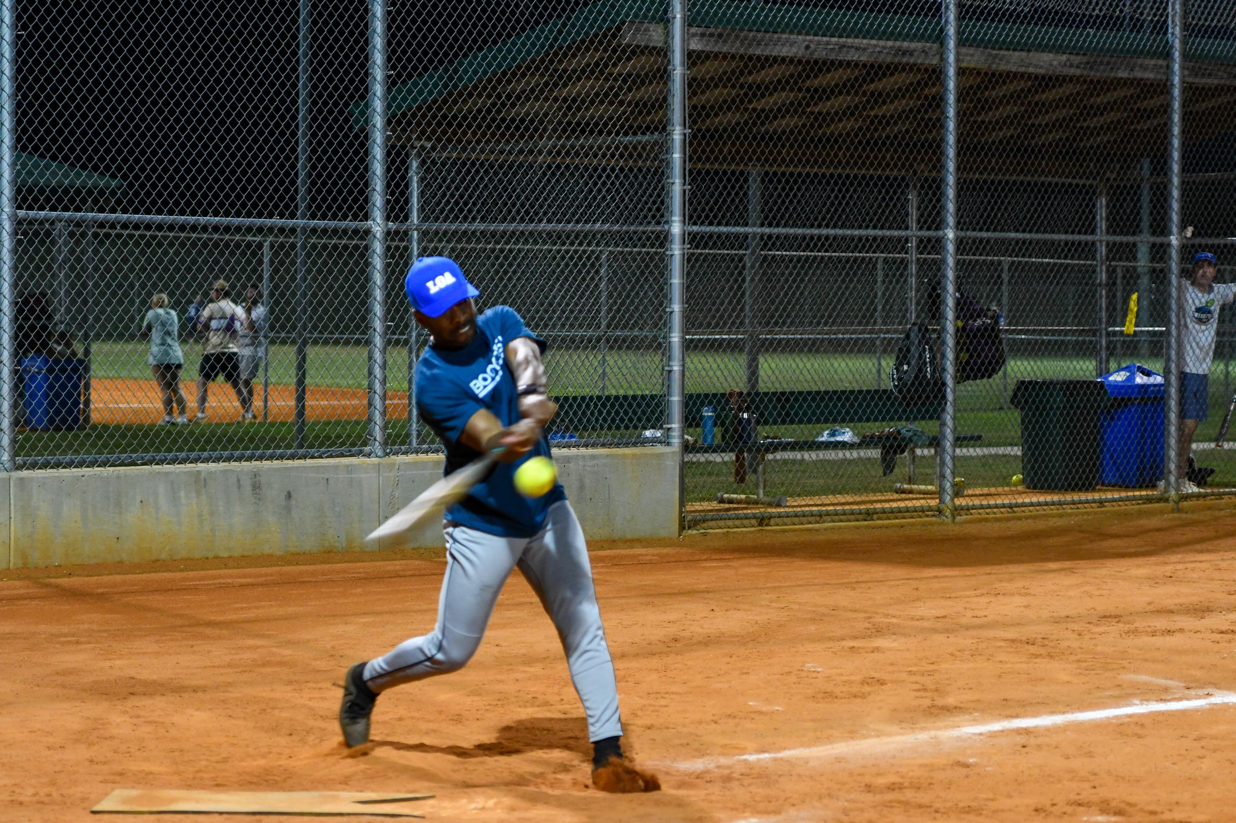 Batter mid-swing on home plate